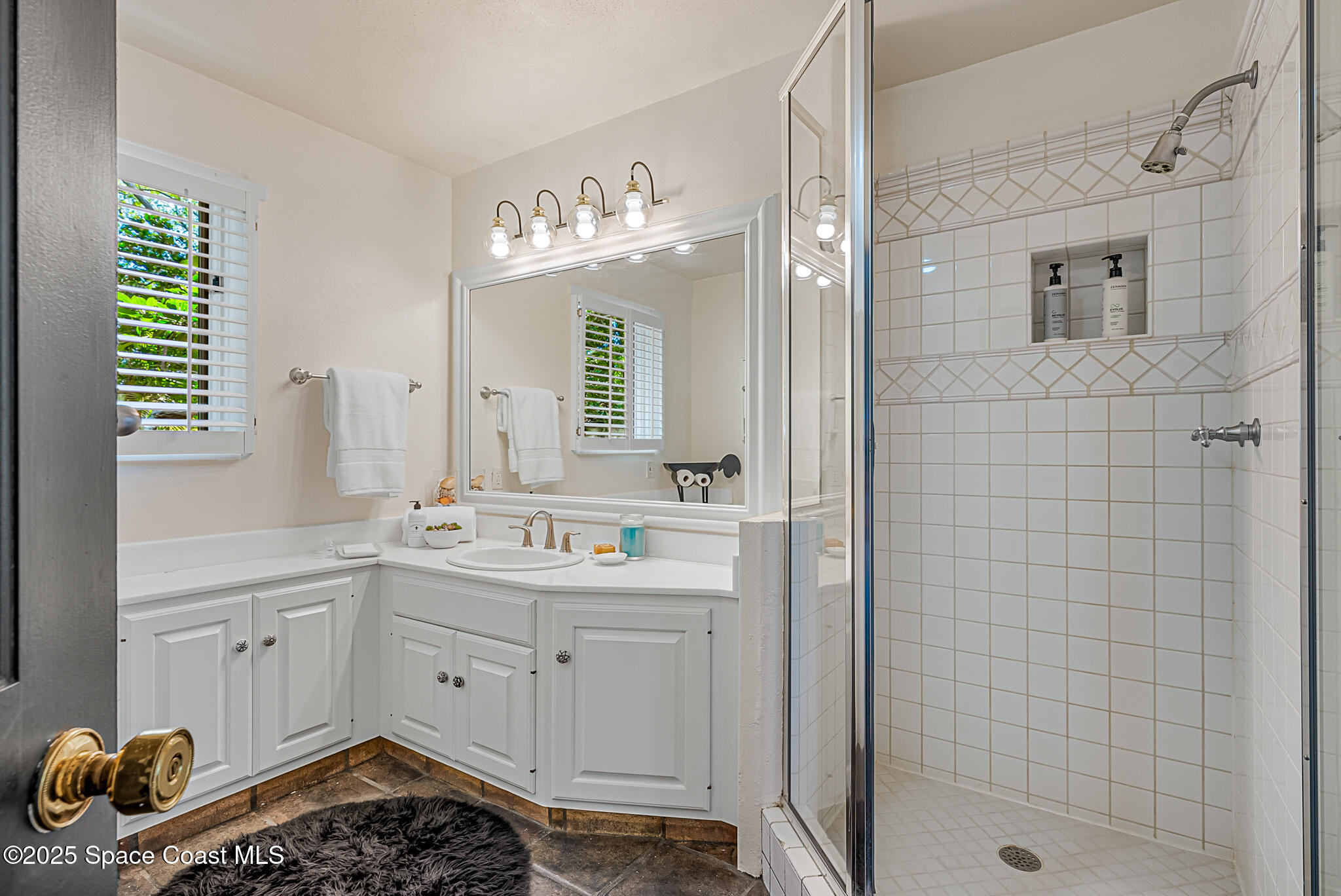 1025 Terry Drive Melbourne, FL 32935 - Photo 34 of 72 a kitchen with a sink and cabinets