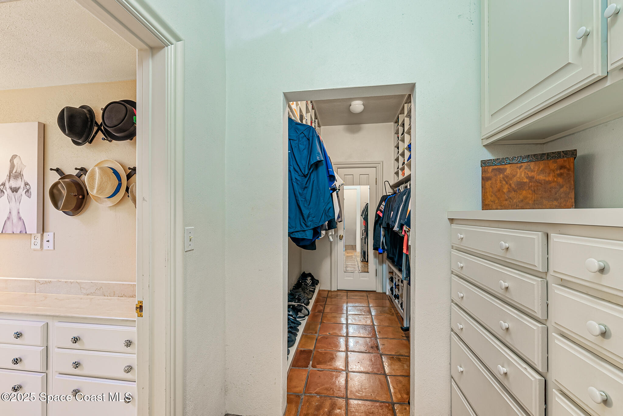 1025 Terry Drive Melbourne, FL 32935 - Photo 49 of 72 a view of walk in closet with white walls