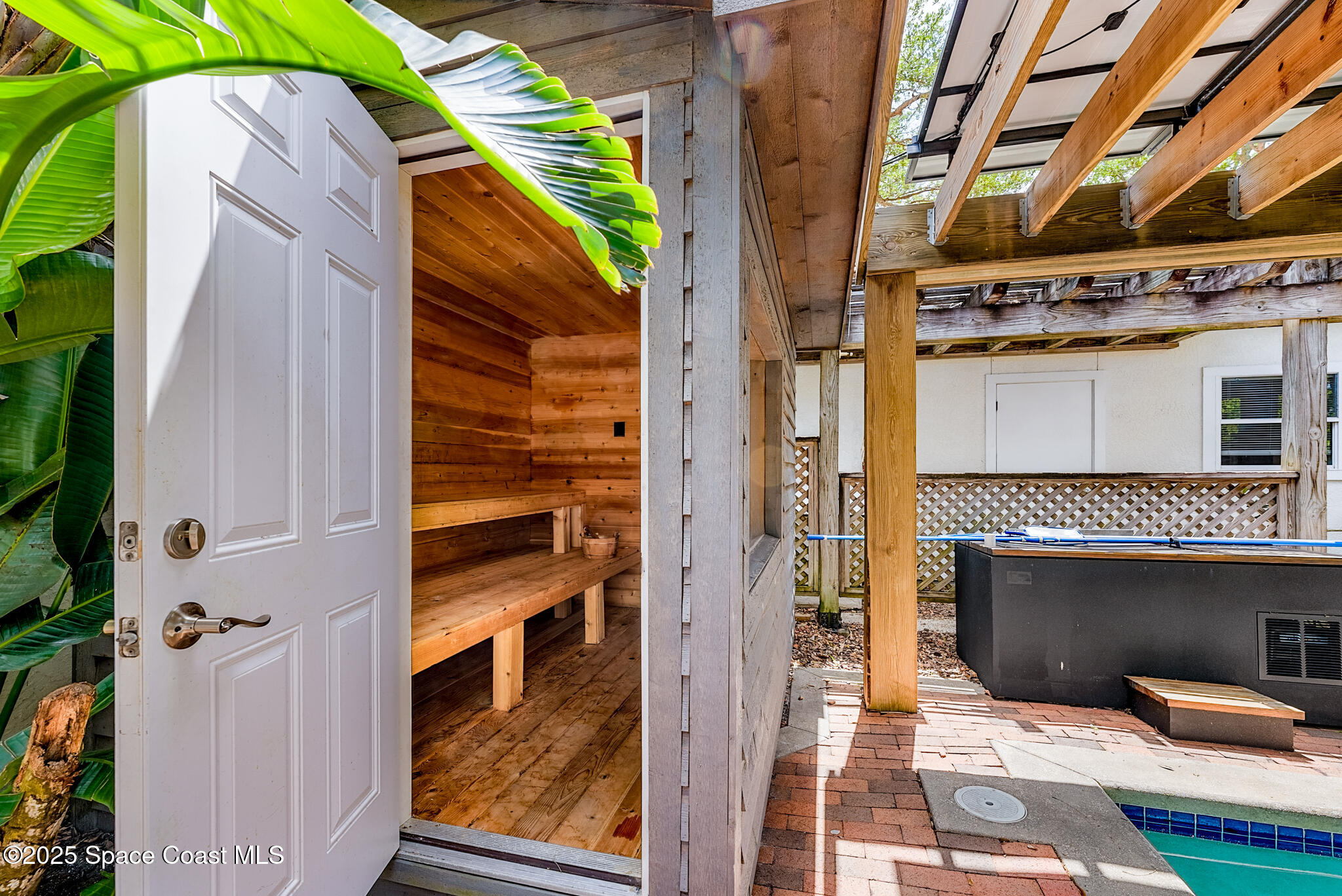 1025 Terry Drive Melbourne, FL 32935 - Photo 65 of 72 a view of entryway with a wooden door