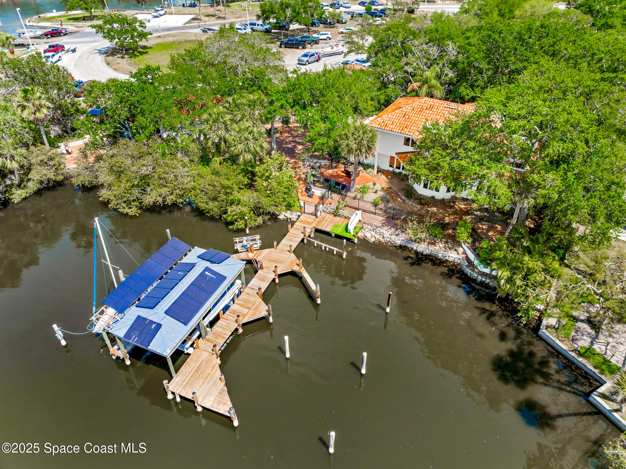 1025 Terry Drive Melbourne, FL 32935 - Photo 8 of 72 an aerial view of a house with a lake view