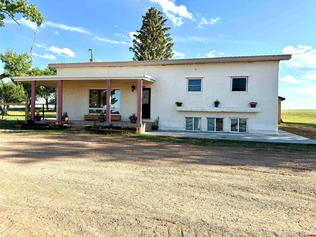 a view of a house with swimming pool