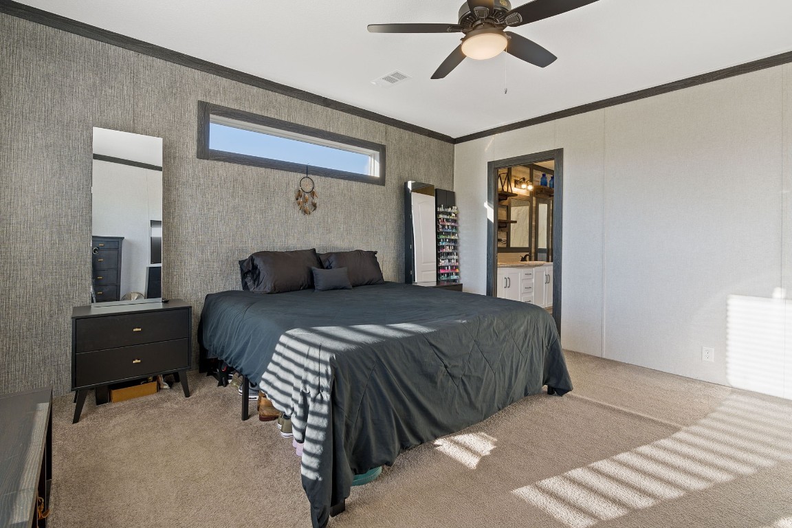 5897 Old Colony Line Road Lockhart, TX 78644 - Photo 12 of 40 a bedroom with a bed and window