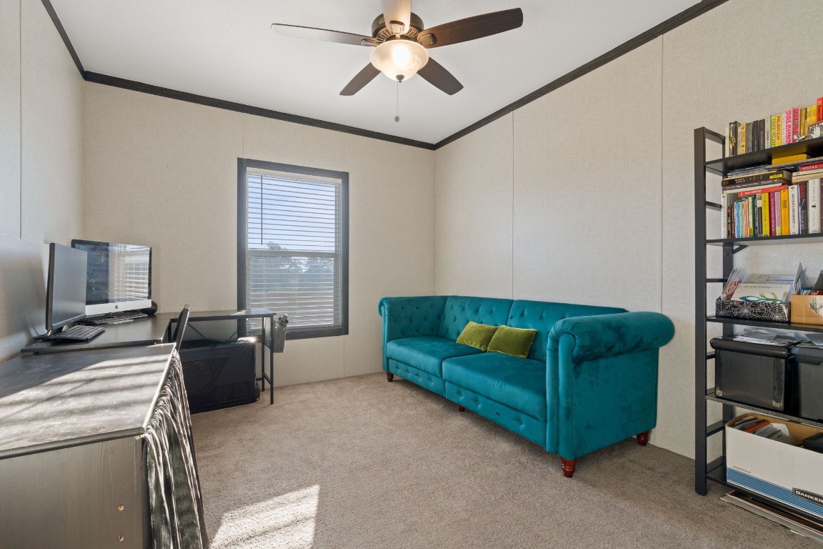 5897 Old Colony Line Road Lockhart, TX 78644 - Photo 18 of 40 a living room with furniture and a flat screen tv