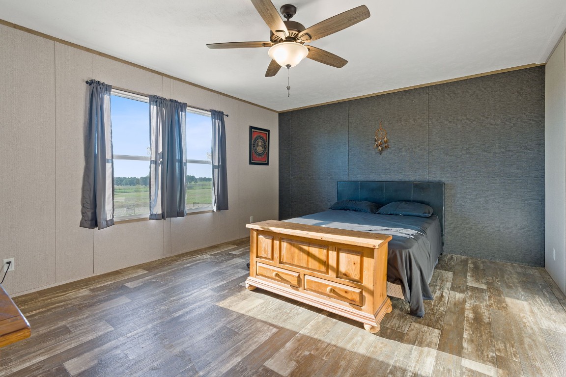 5897 Old Colony Line Road Lockhart, TX 78644 - Photo 29 of 40 a living room with hard wood floors and a window