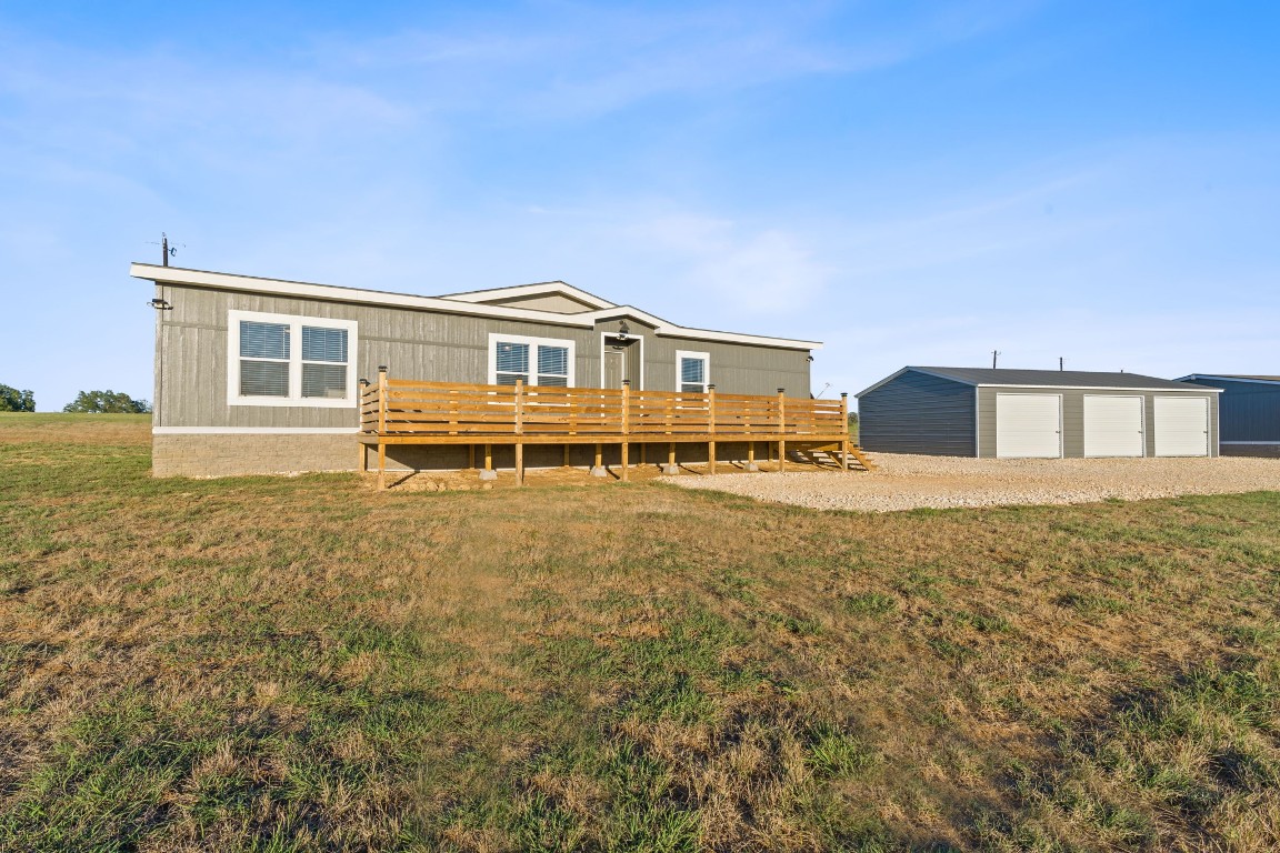 5897 Old Colony Line Road Lockhart, TX 78644 - Photo 4 of 40 a front view of a house with a yard