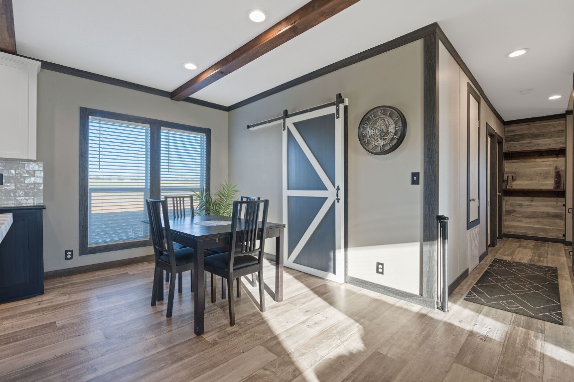 5897 Old Colony Line Road Lockhart, TX 78644 - Photo 8 of 40 a view of a dining room with furniture and a large window