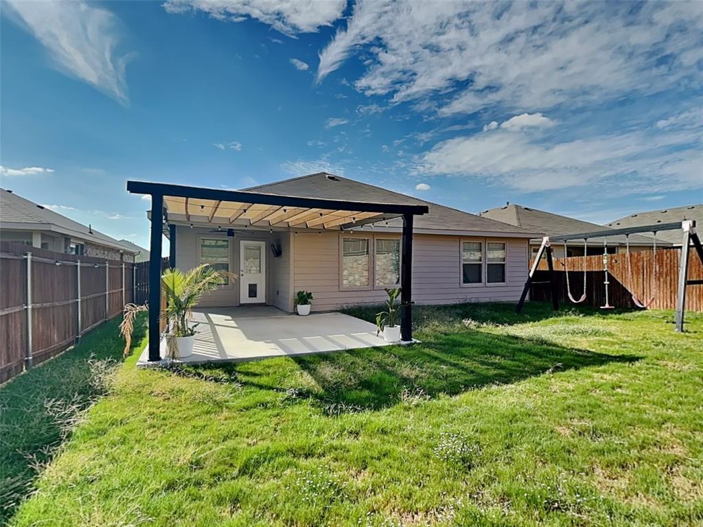 2313 Marshville Road Fort Worth, TX 76108 - Photo 17 of 17 a view of a house with a back yard