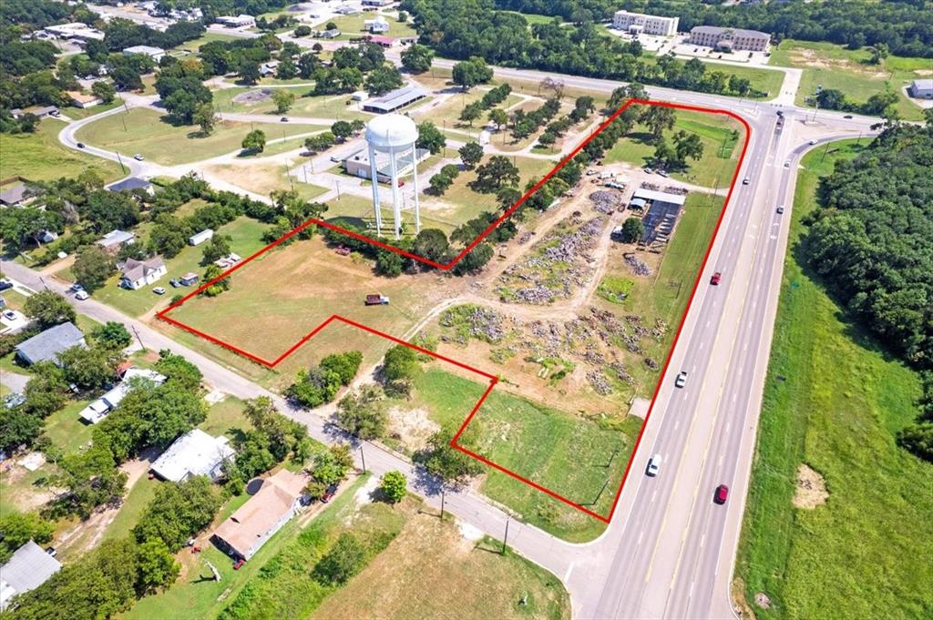 604 State Highway 121 Bonham, TX 75418 - Photo 1 of 21 an aerial view of a house