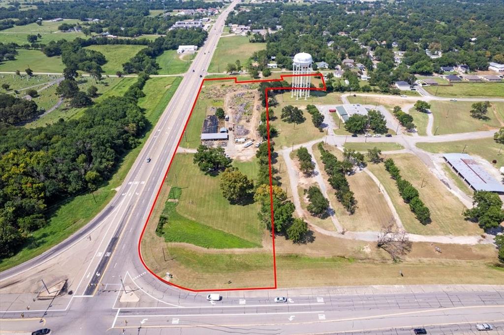 604 State Highway 121 Bonham, TX 75418 - Photo 4 of 21 an aerial view of residential houses with outdoor space