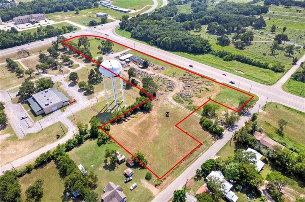 604 State Highway 121 Bonham, TX 75418 - Photo 6 of 21 an aerial view of a house