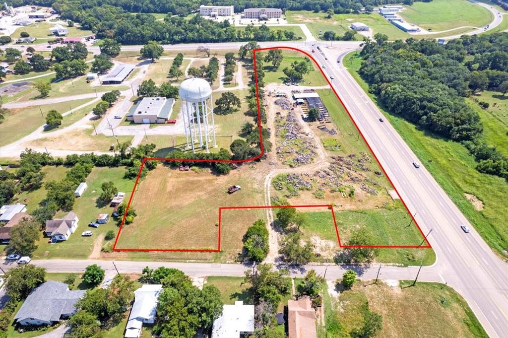 604 State Highway 121 Bonham, TX 75418 - Photo 7 of 21 an aerial view of residential houses with outdoor space