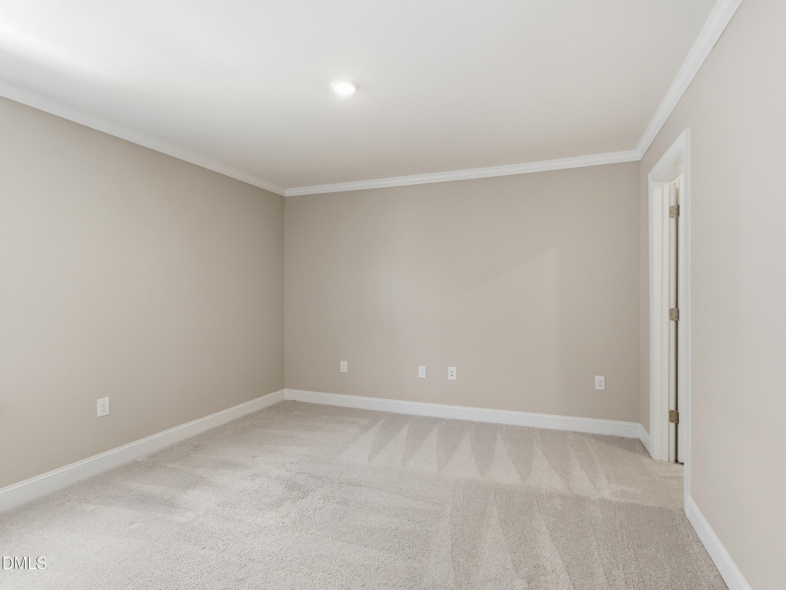2709 Womble Ridge Drive New Hill, NC 27562 - Photo 42 of 60 a view of an empty room