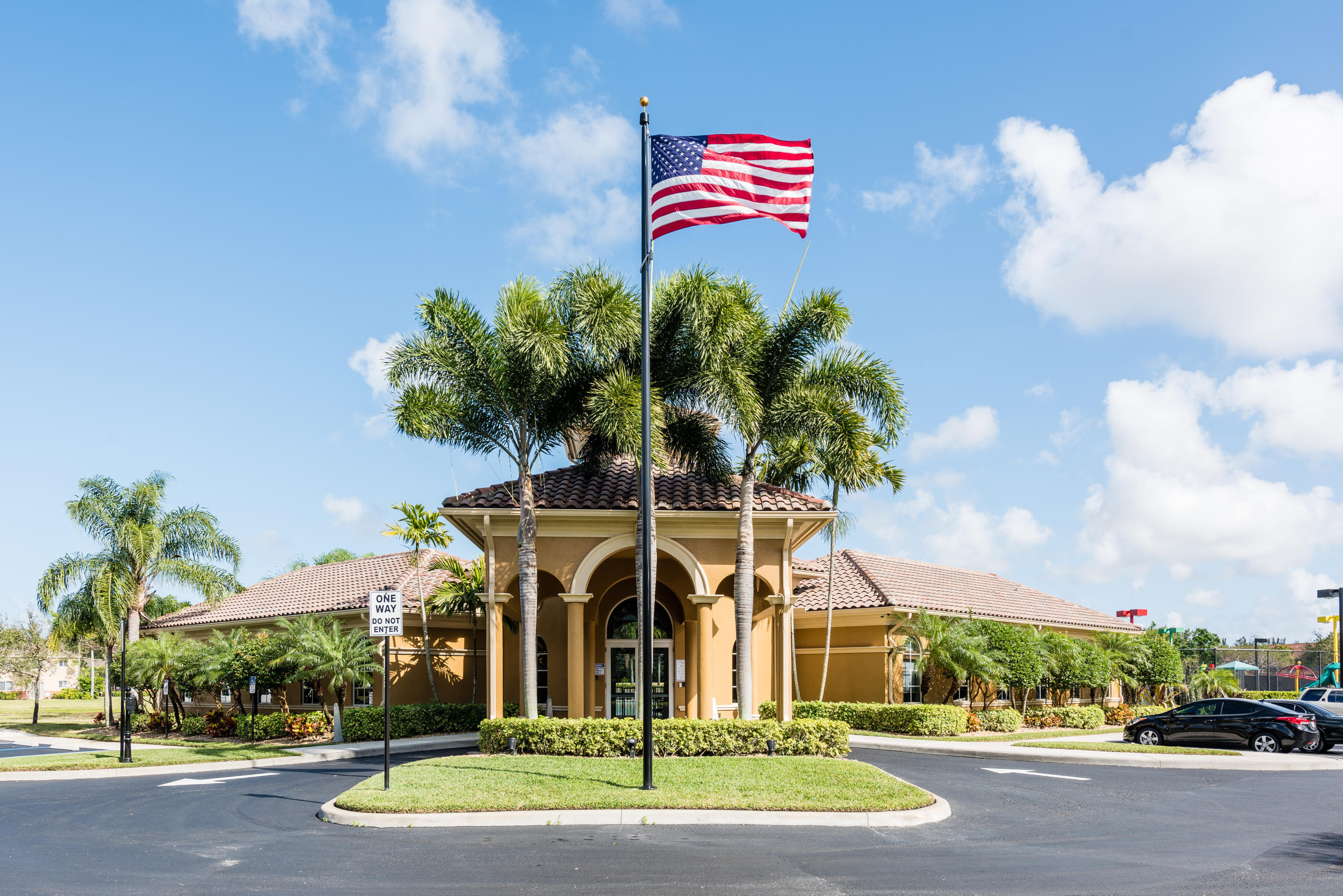 3232 Bollard Road West Palm Beach, FL 33411 - Photo 28 of 33 BriarBay_ClubhouseFlag