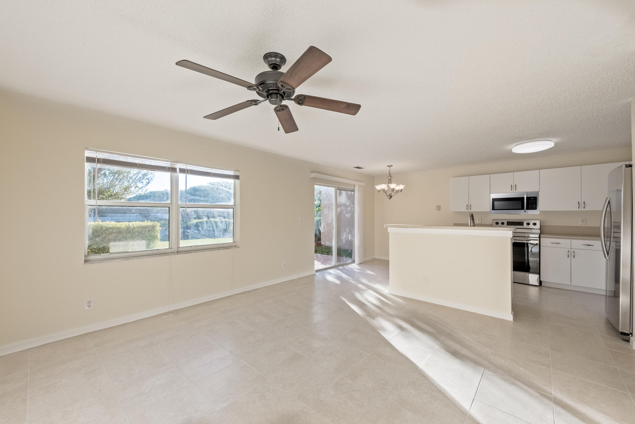3232 Bollard Road West Palm Beach, FL 33411 - Photo 4 of 33 Living Room Looking Toward Kitchen