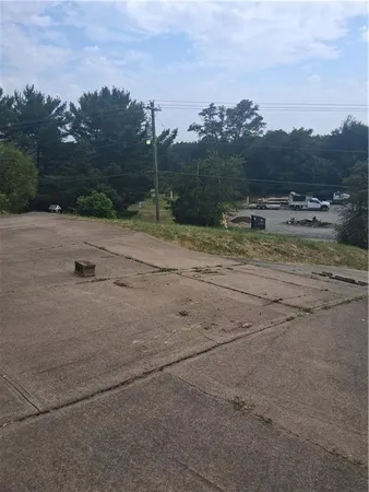 a view of a dry yard with mountain