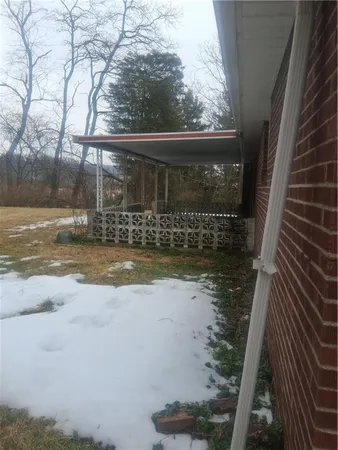 a view of swimming pool with a yard