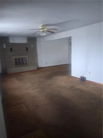 a view of a room with an empty space