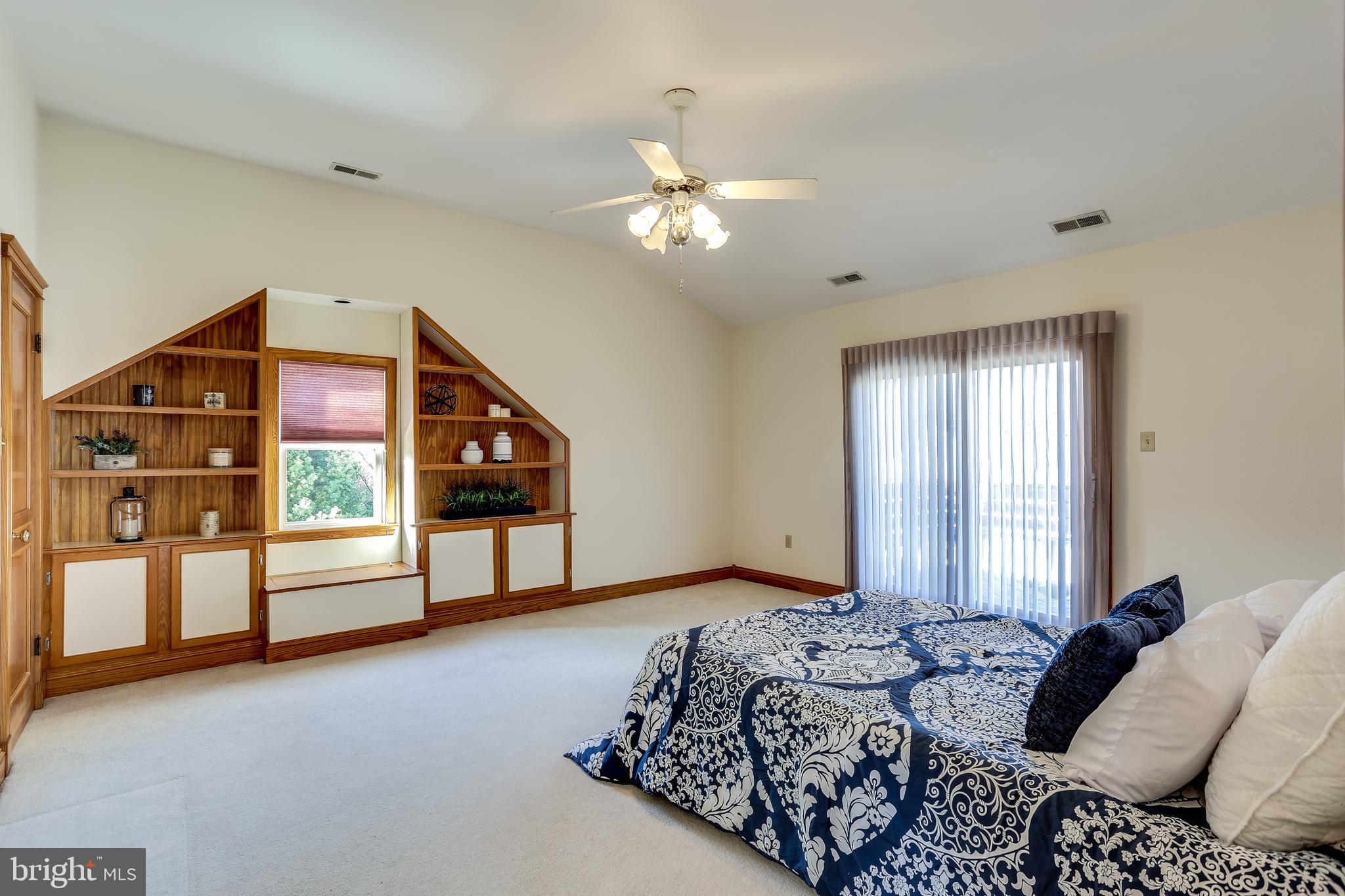 536 Cleveland Road Linthicum Heights, MD 21090 - Photo 12 of 33 Spacious upper level primary bedroom w/built-ins