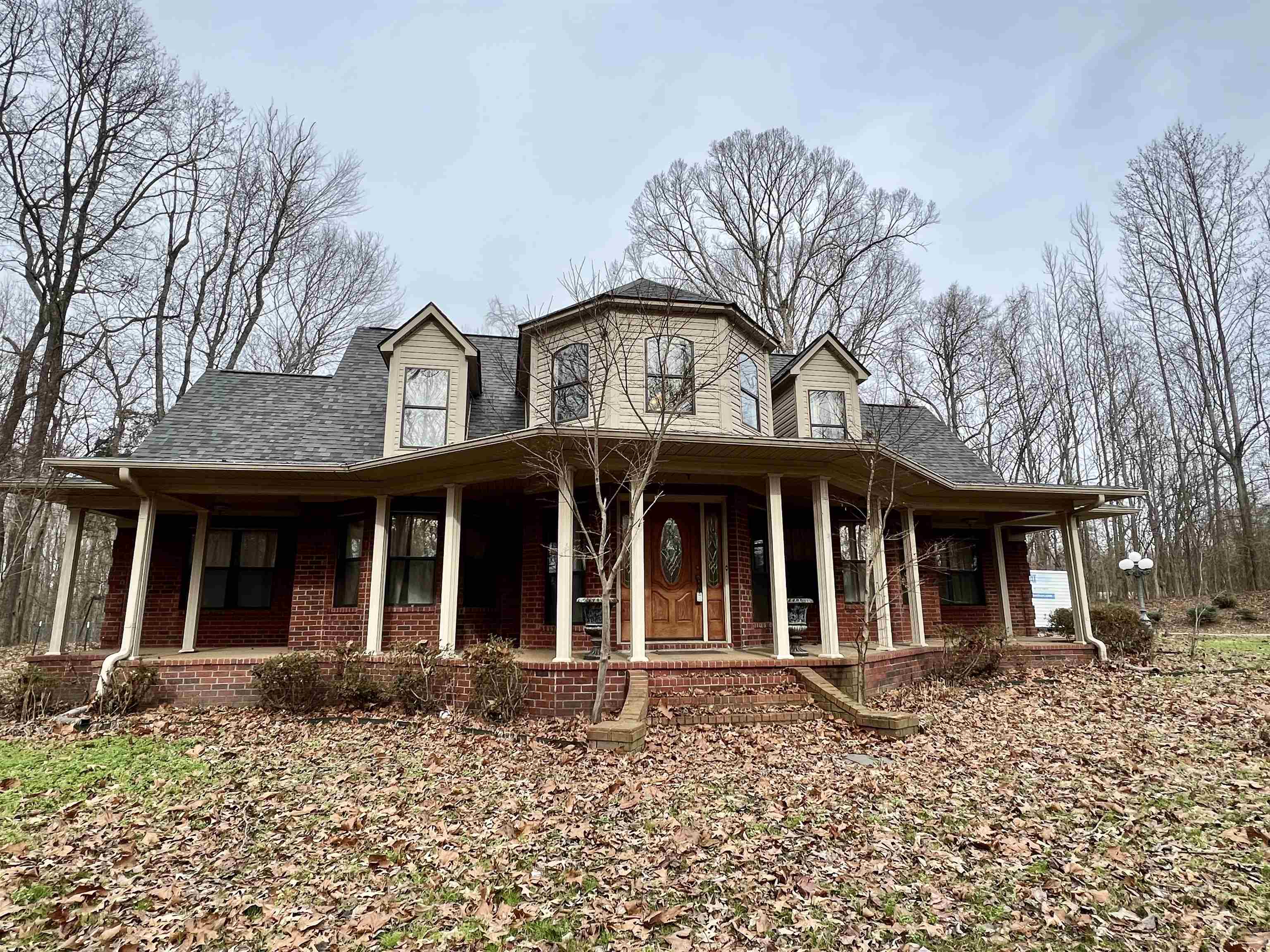 2522 Dunlap Orphanage Road Brighton, TN 38011 - Photo 1 of 22 front view of a house with a dry yard