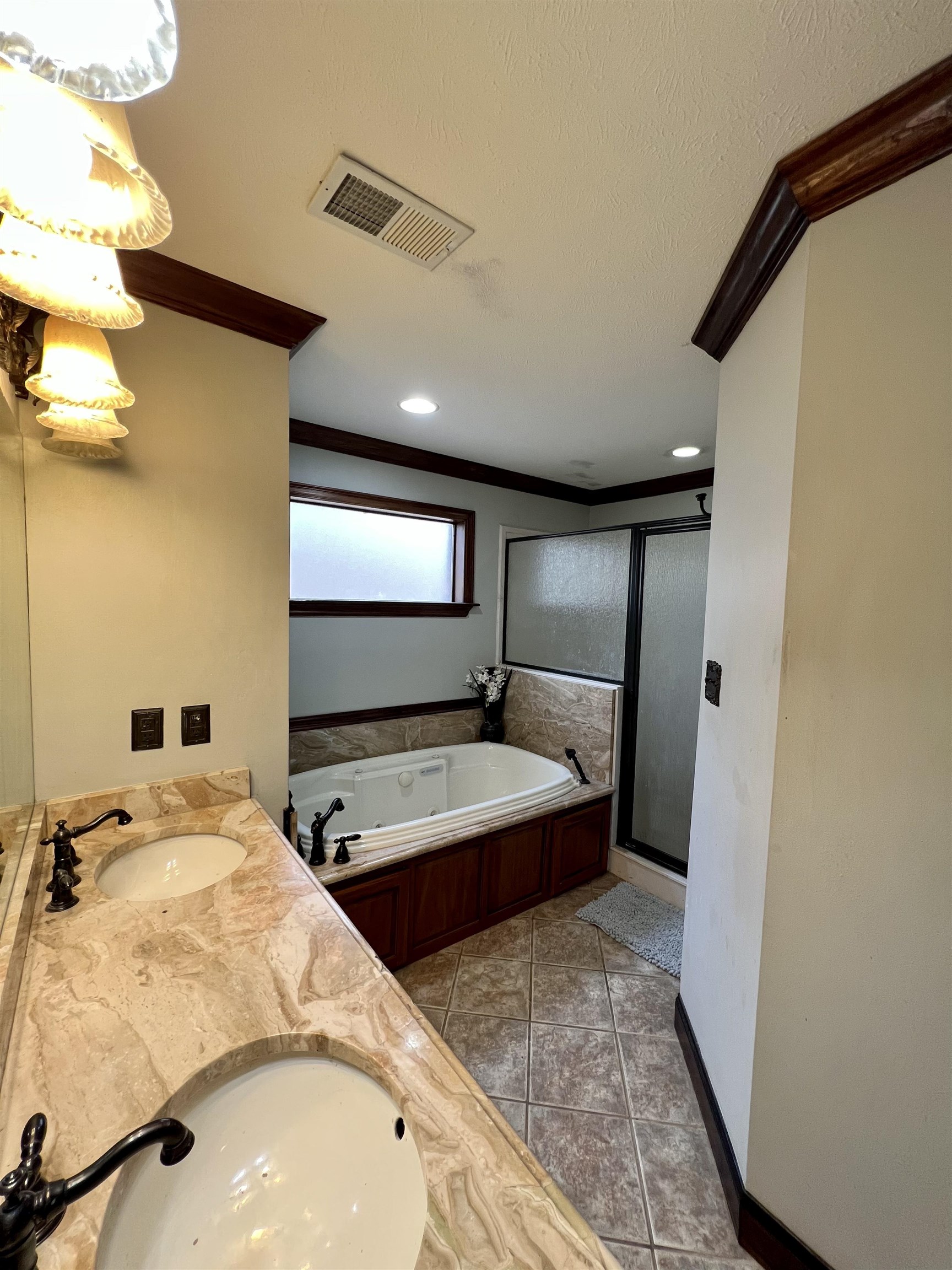 2522 Dunlap Orphanage Road Brighton, TN 38011 - Photo 16 of 22 a bathroom with a tub and a sink