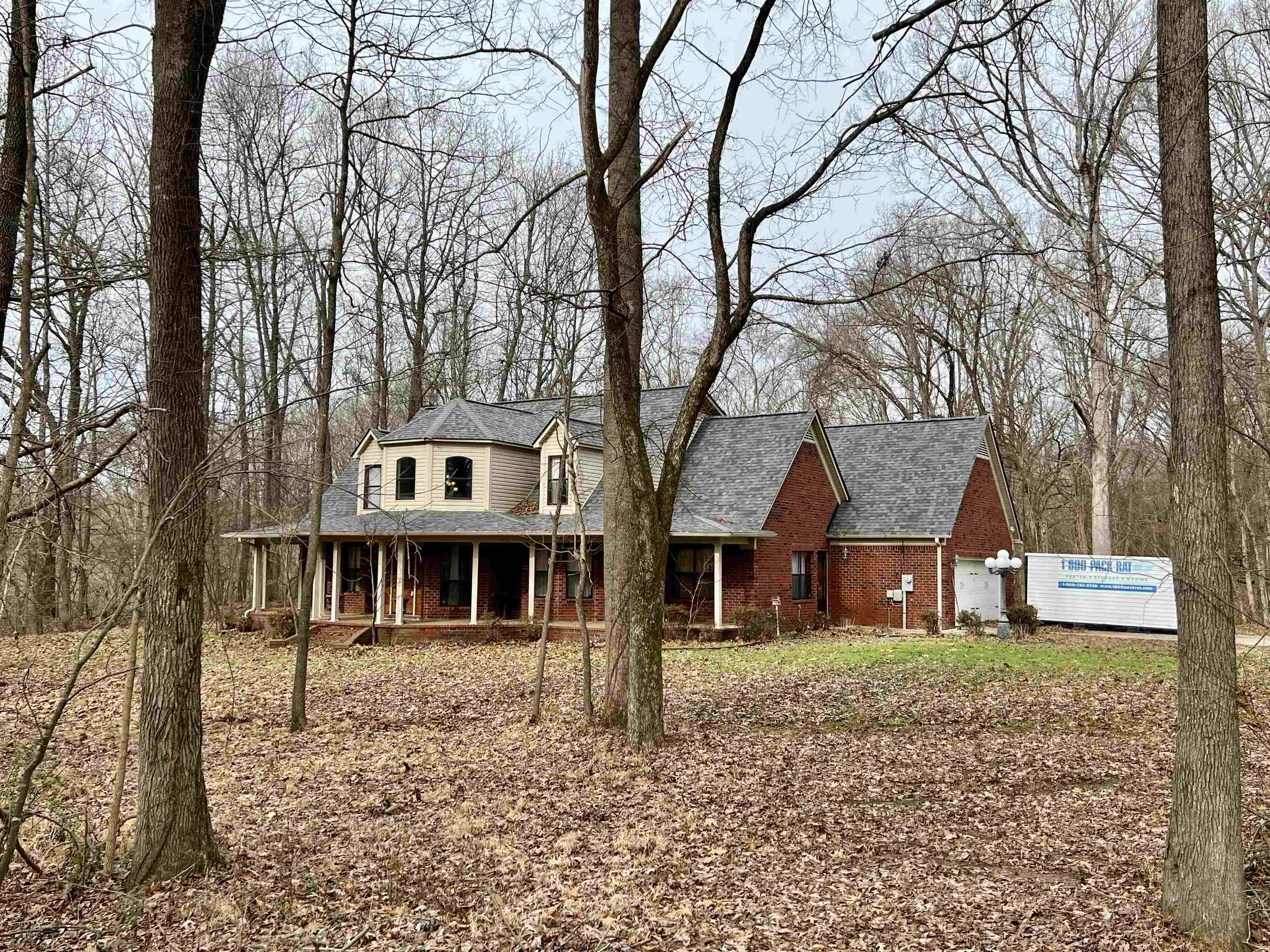 2522 Dunlap Orphanage Road Brighton, TN 38011 - Photo 2 of 22 a front view of a house with a garden