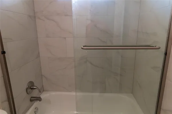 a close view of a bathtub in bathroom