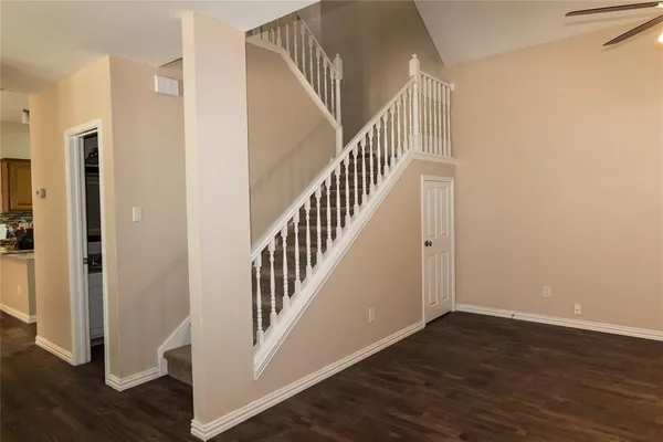 a view of entryway with wooden floor