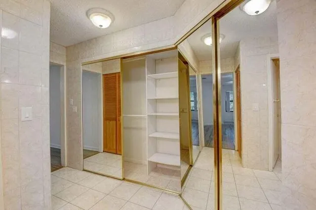 front view of a house with a garden