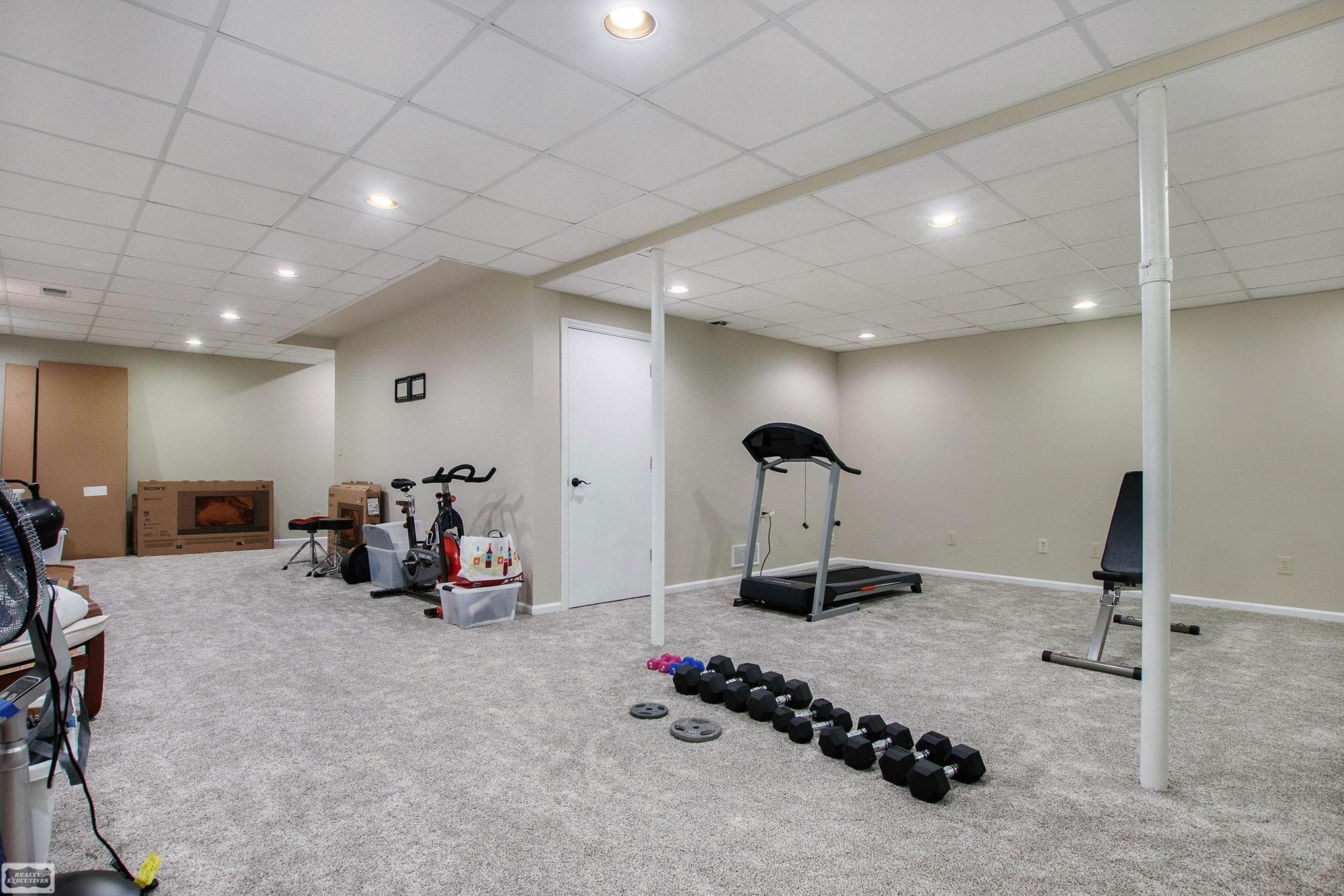 5235 Greer Road West Bloomfield, MI 48324 - Photo 31 of 40 Finished lower level