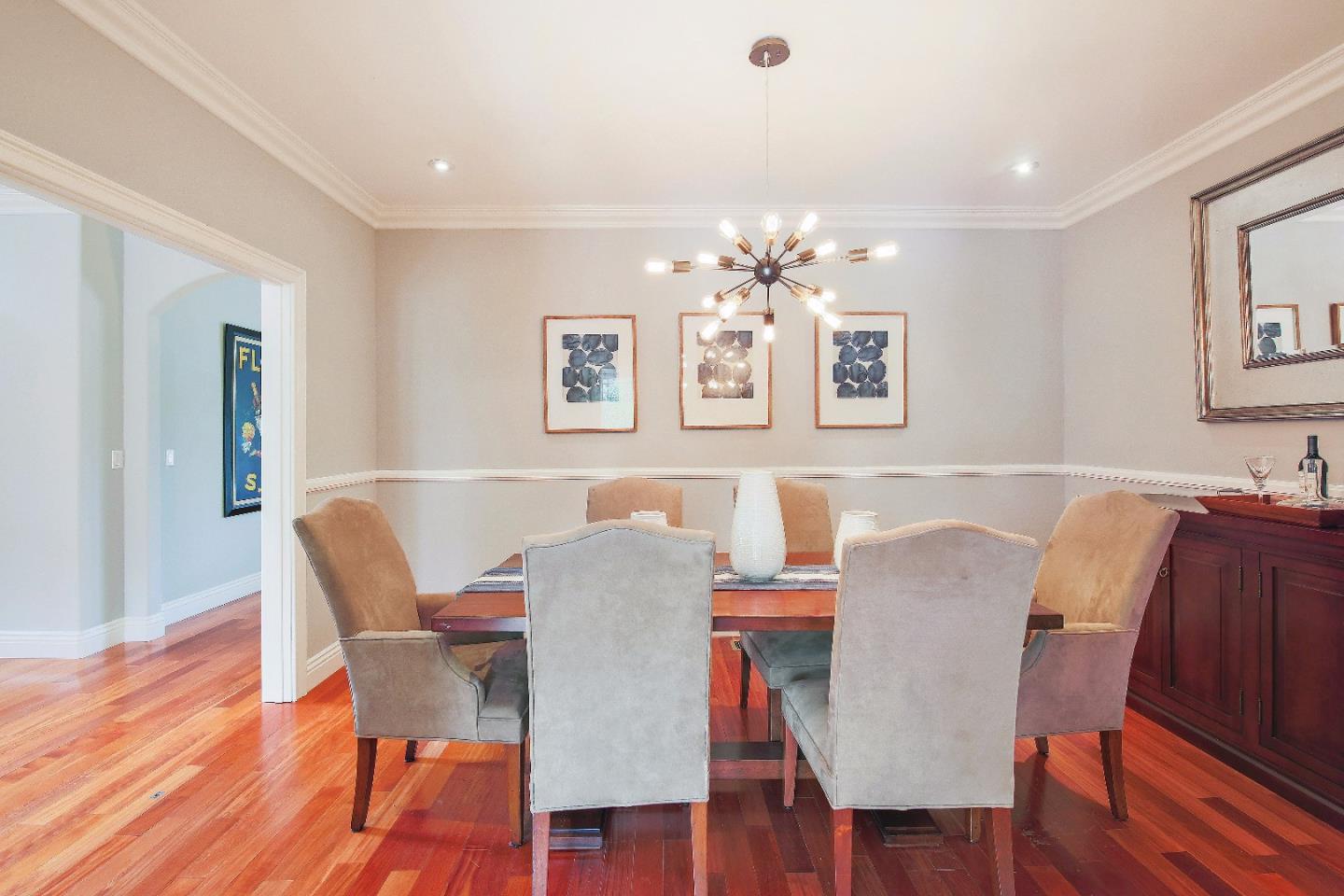 1637 Westmoor Road Burlingame, CA 94010 - Photo 18 of 54 a view of a dining room with furniture and wooden floor