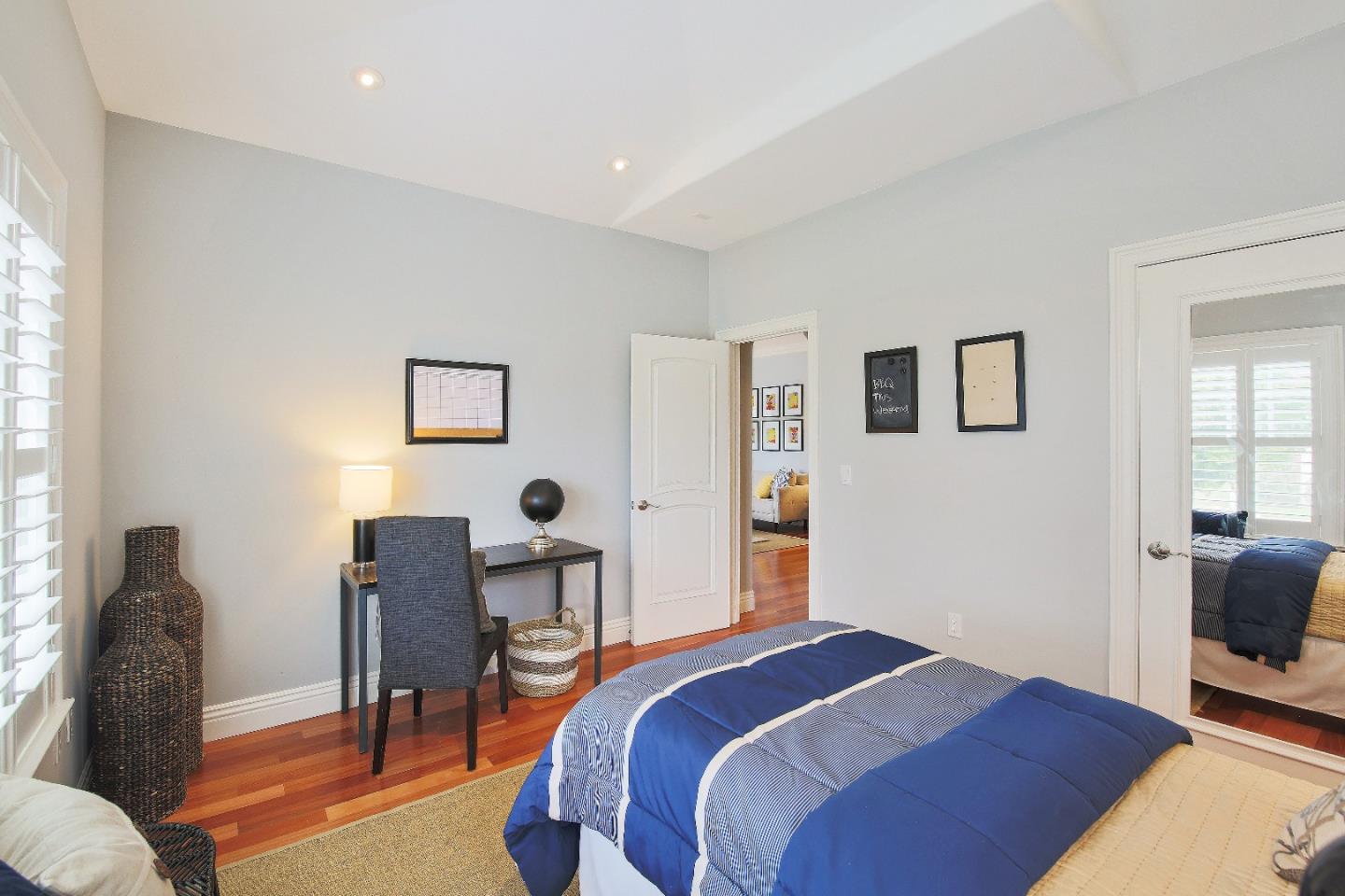 1637 Westmoor Road Burlingame, CA 94010 - Photo 29 of 54 a bedroom with a bed and a chair