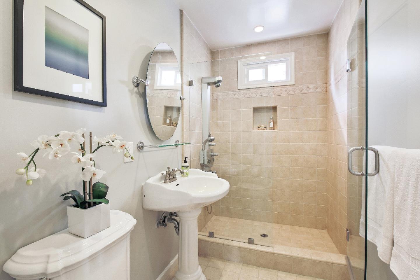 1637 Westmoor Road Burlingame, CA 94010 - Photo 30 of 54 a bathroom with a sink toilet and shower