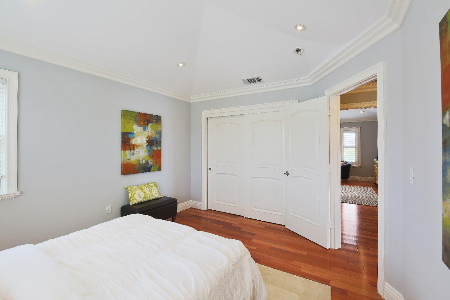 1637 Westmoor Road Burlingame, CA 94010 - Photo 44 of 54 a bedroom with a bed and painting on the wall