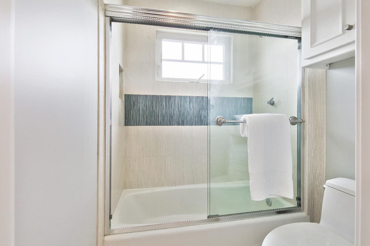 1637 Westmoor Road Burlingame, CA 94010 - Photo 46 of 54 a bathroom with a bathtub and a shower