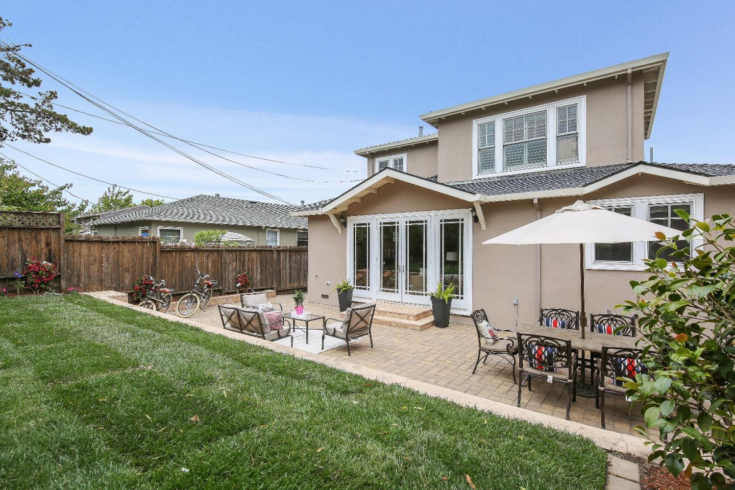 1637 Westmoor Road Burlingame, CA 94010 - Photo 51 of 54 a patio with a table and chairs and potted plants