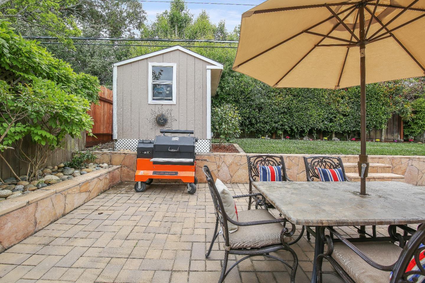 1637 Westmoor Road Burlingame, CA 94010 - Photo 54 of 54 a backyard of a house with yard and outdoor seating