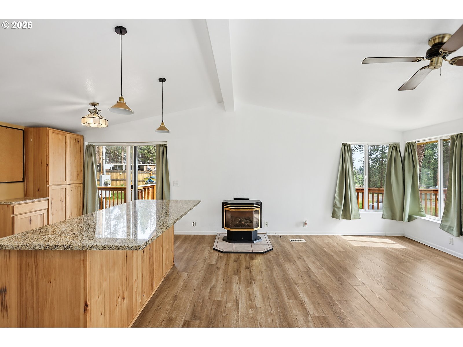 39 North Eagle Point Road Tygh Valley, OR 97063 - Photo 11 of 34 a living room with furniture and a wooden floor