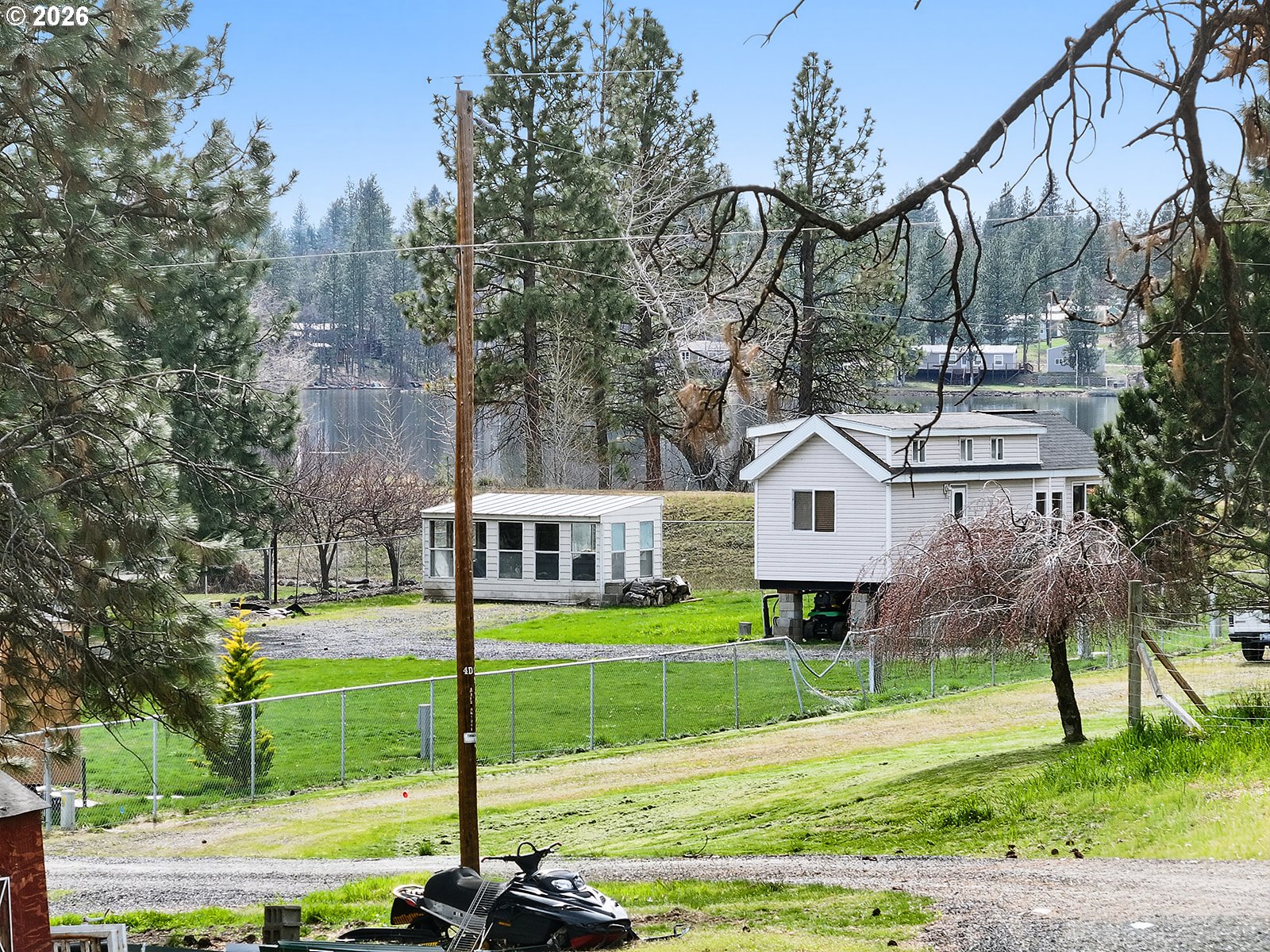 39 North Eagle Point Road Tygh Valley, OR 97063 - Photo 26 of 34 a view of a house with a big yard and large trees