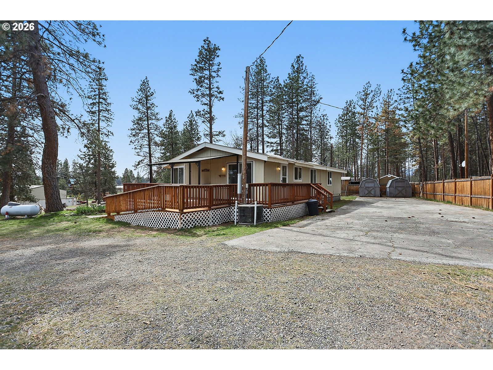 39 North Eagle Point Road Tygh Valley, OR 97063 - Photo 29 of 34 a view of a house with backyard and trees