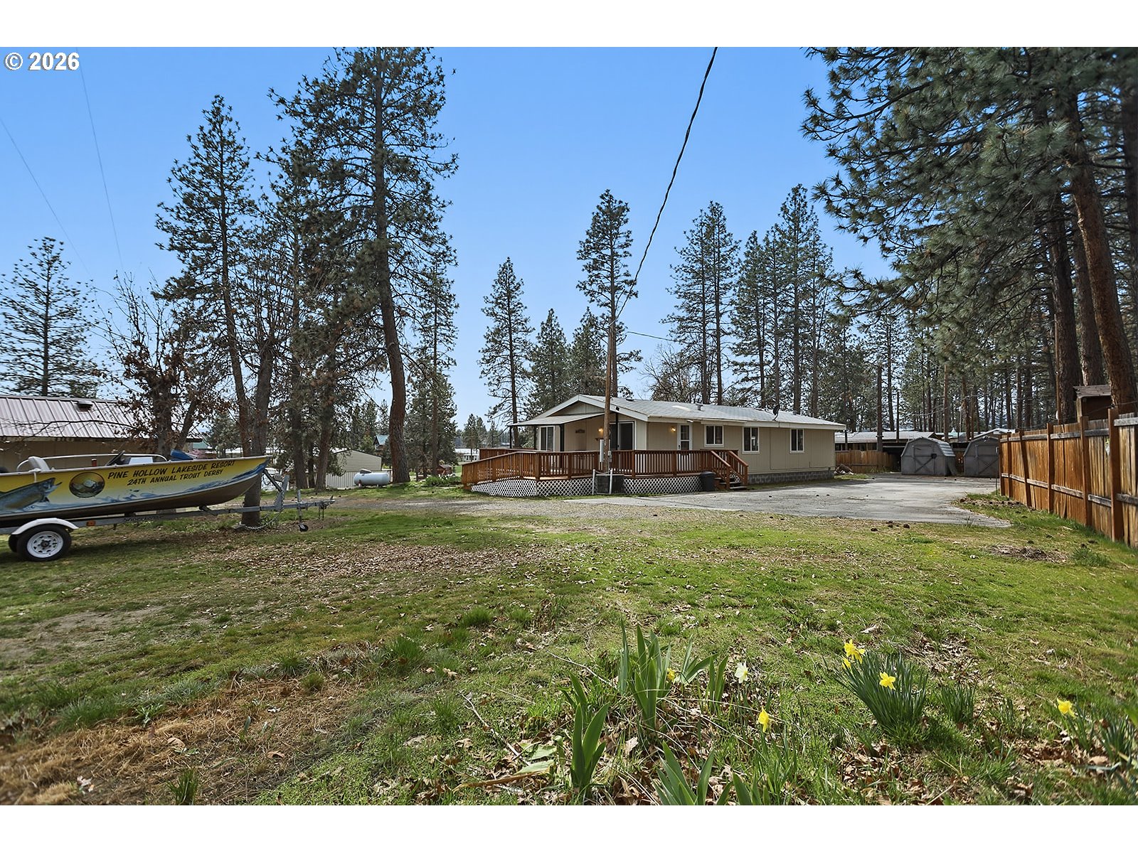 39 North Eagle Point Road Tygh Valley, OR 97063 - Photo 30 of 34 a view of a house with backyard and trees