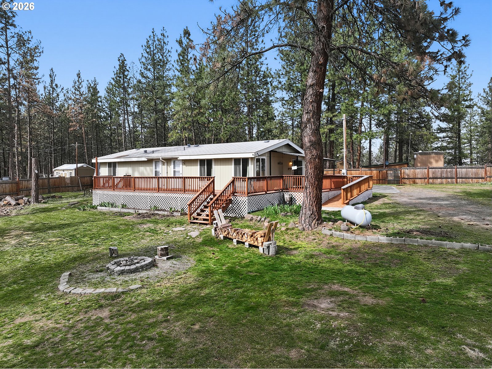 39 North Eagle Point Road Tygh Valley, OR 97063 - Photo 3 of 34 a view of a house with a yard porch and sitting area