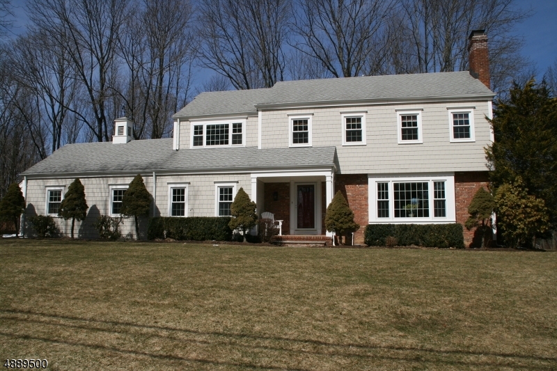 22 Rolling Hill Drive Morristown, NJ 07960 - Photo 1 of 17 a front view of a house with a yard