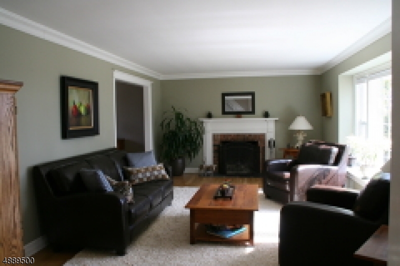 22 Rolling Hill Drive Morristown, NJ 07960 - Photo 3 of 17 a living room with furniture and a fireplace