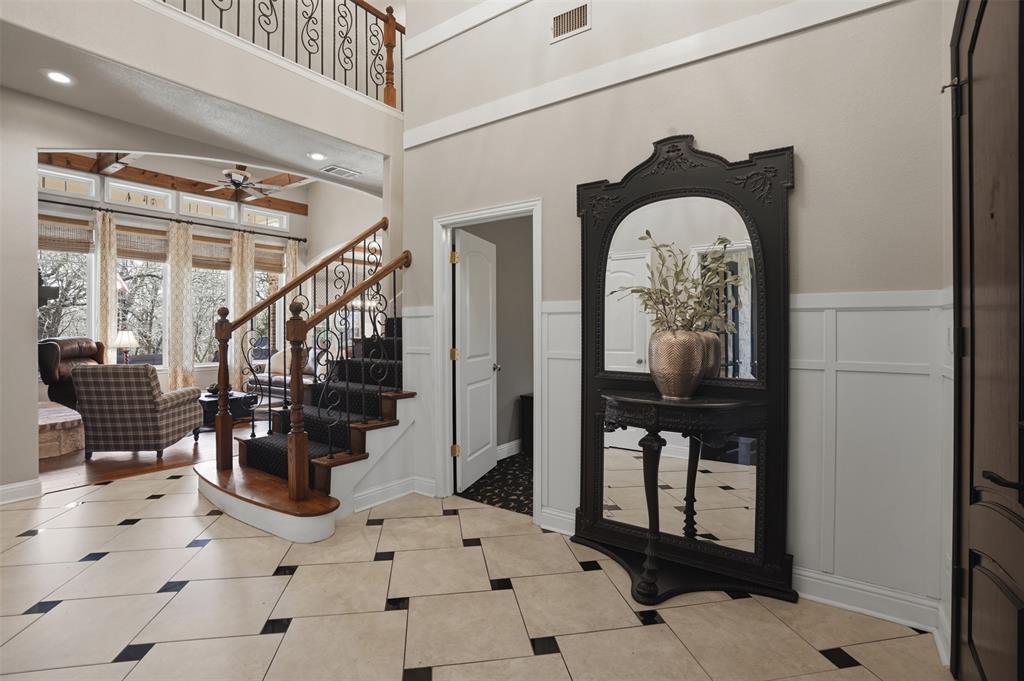 9651 Yellow Rose Lane Pilot Point, TX 76258 - Photo 4 of 38 a view of entryway and hall with wooden floor
