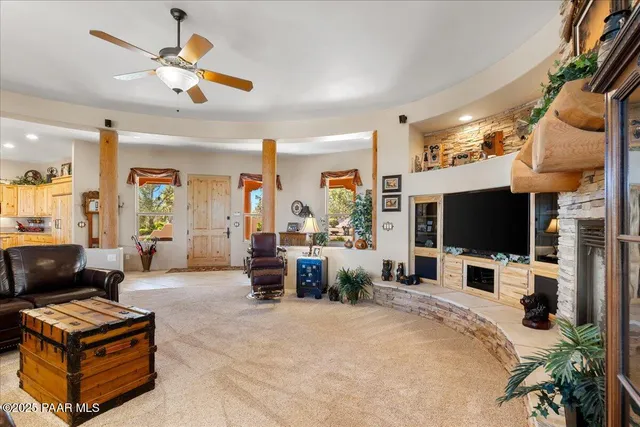 a room with furniture and a flat screen tv