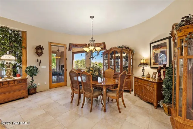 a kitchen with stainless steel appliances a stove a sink and a refrigerator