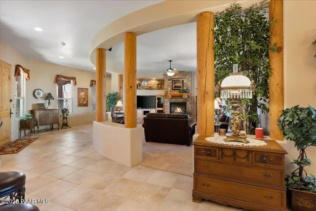 a view of a patio with table and chairs