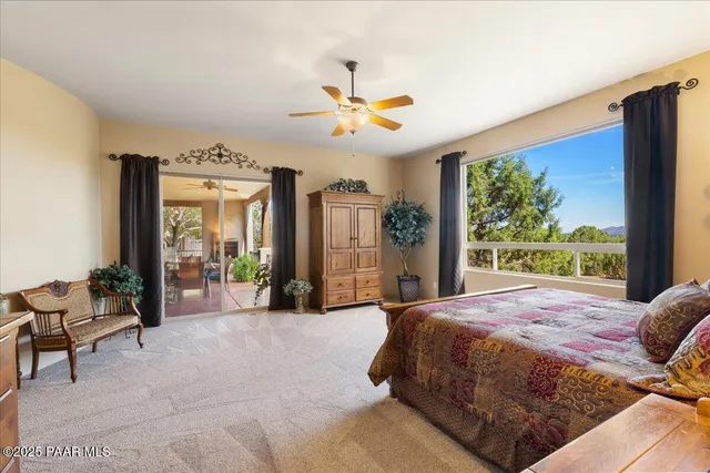 an aerial view of residential houses with city view