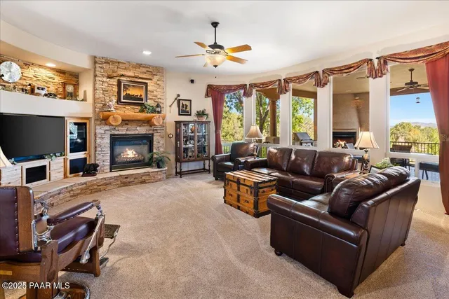 a bathroom with a granite countertop toilet sink and mirror