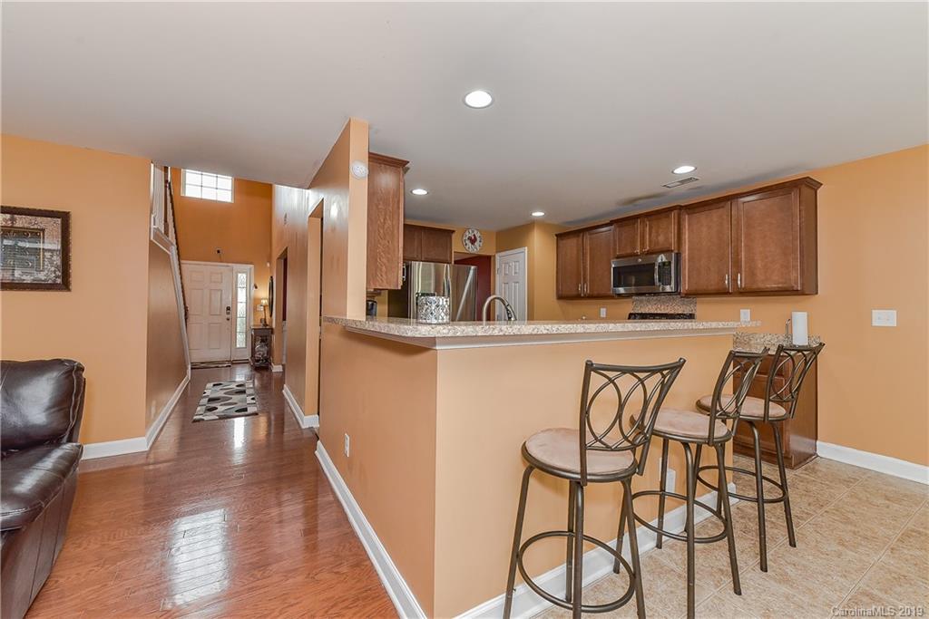 10818 Greenhead View Road Charlotte, NC 28262 - Photo 11 of 39 a view of a kitchen and dining room